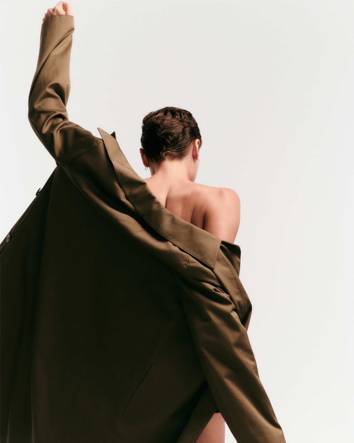 clothing,formal wear,suit,coat,fashion,blazer,jacket,dress,dancing,person