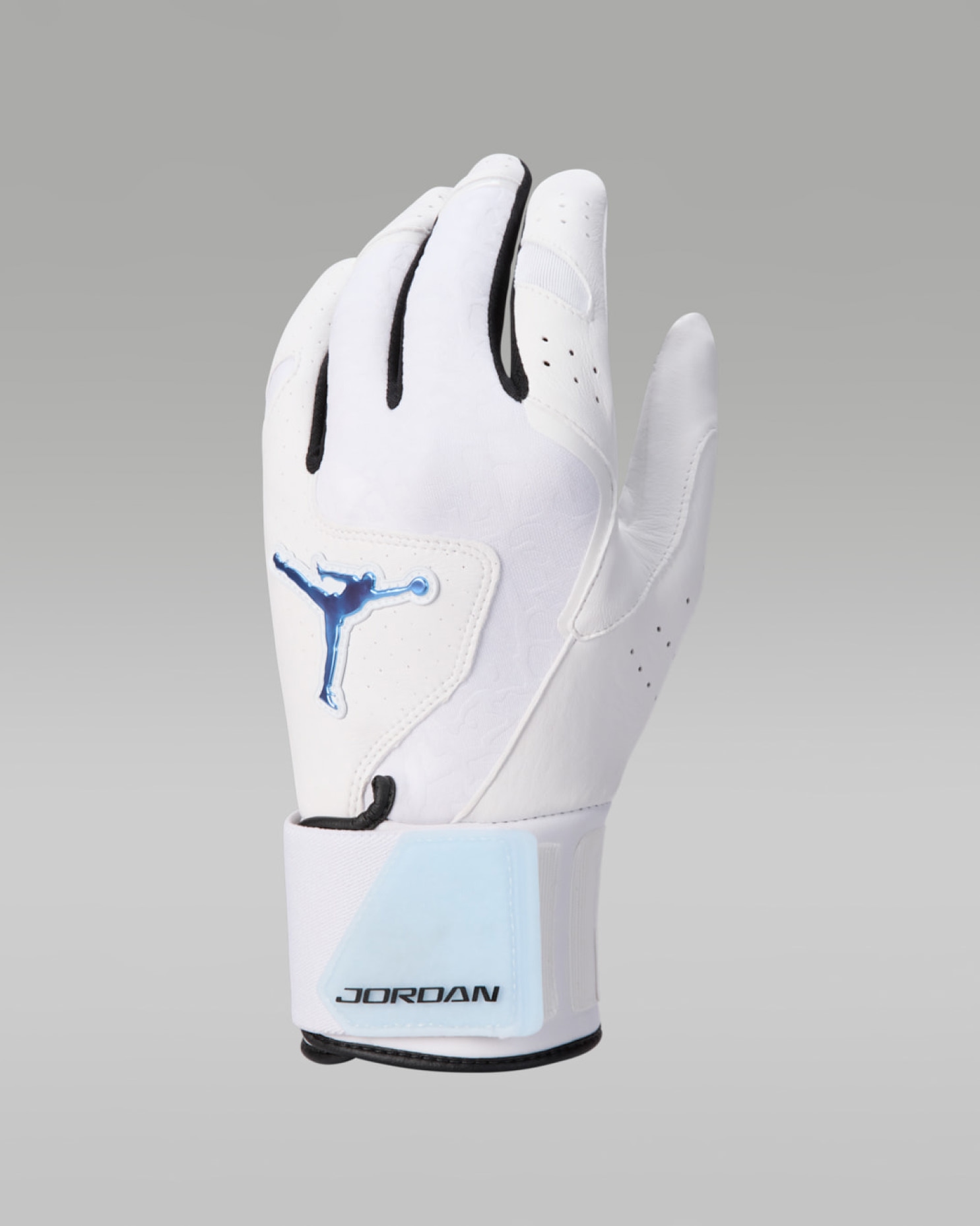 White Jordan golf glove with chrome Jumpman logo on back of hand and wordmark on wrist strap