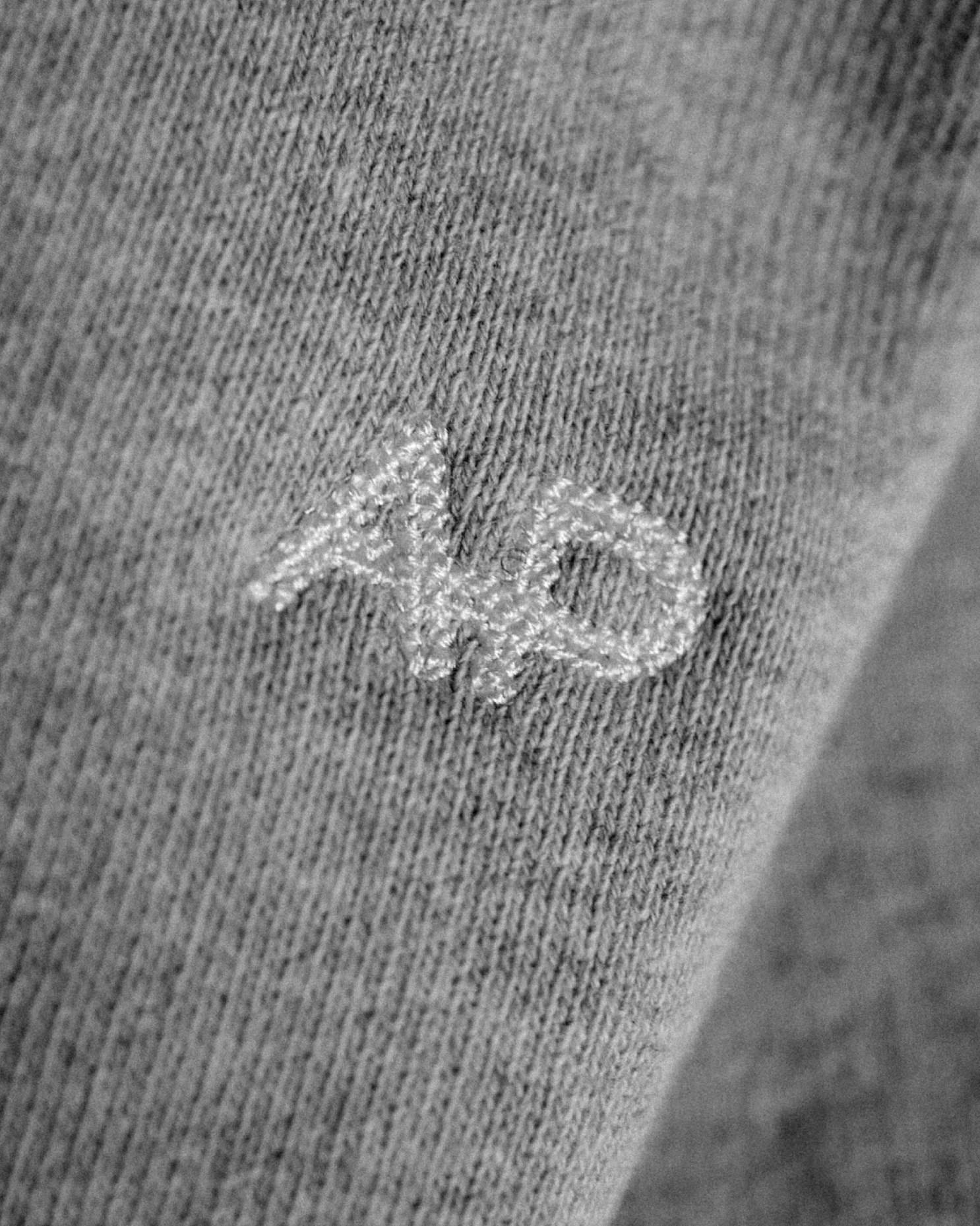 home decor,linen,clothing,pants,knitwear,sweater,symbol,logo
