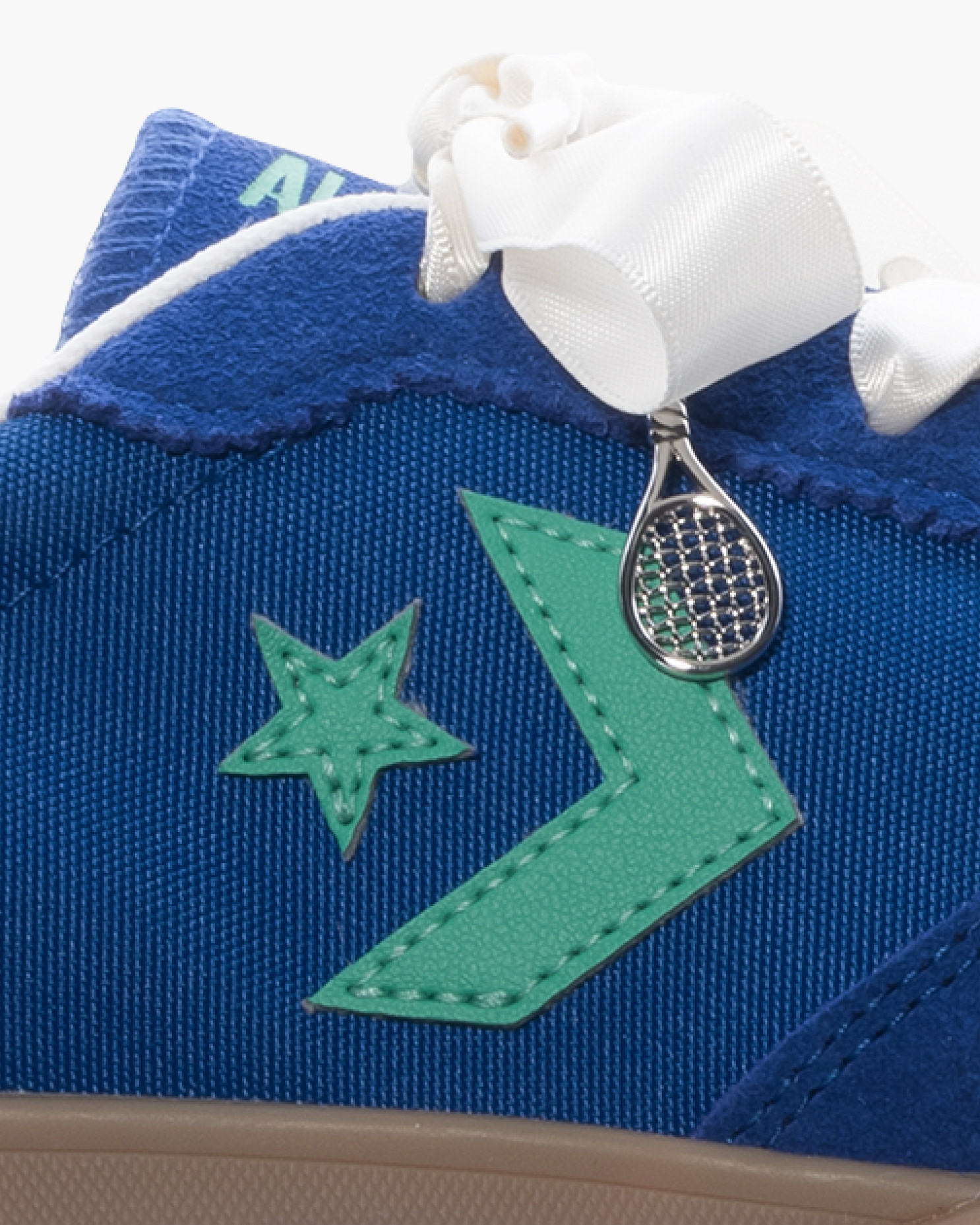 clothing,footwear,shoe,applique,pattern,sneaker,symbol