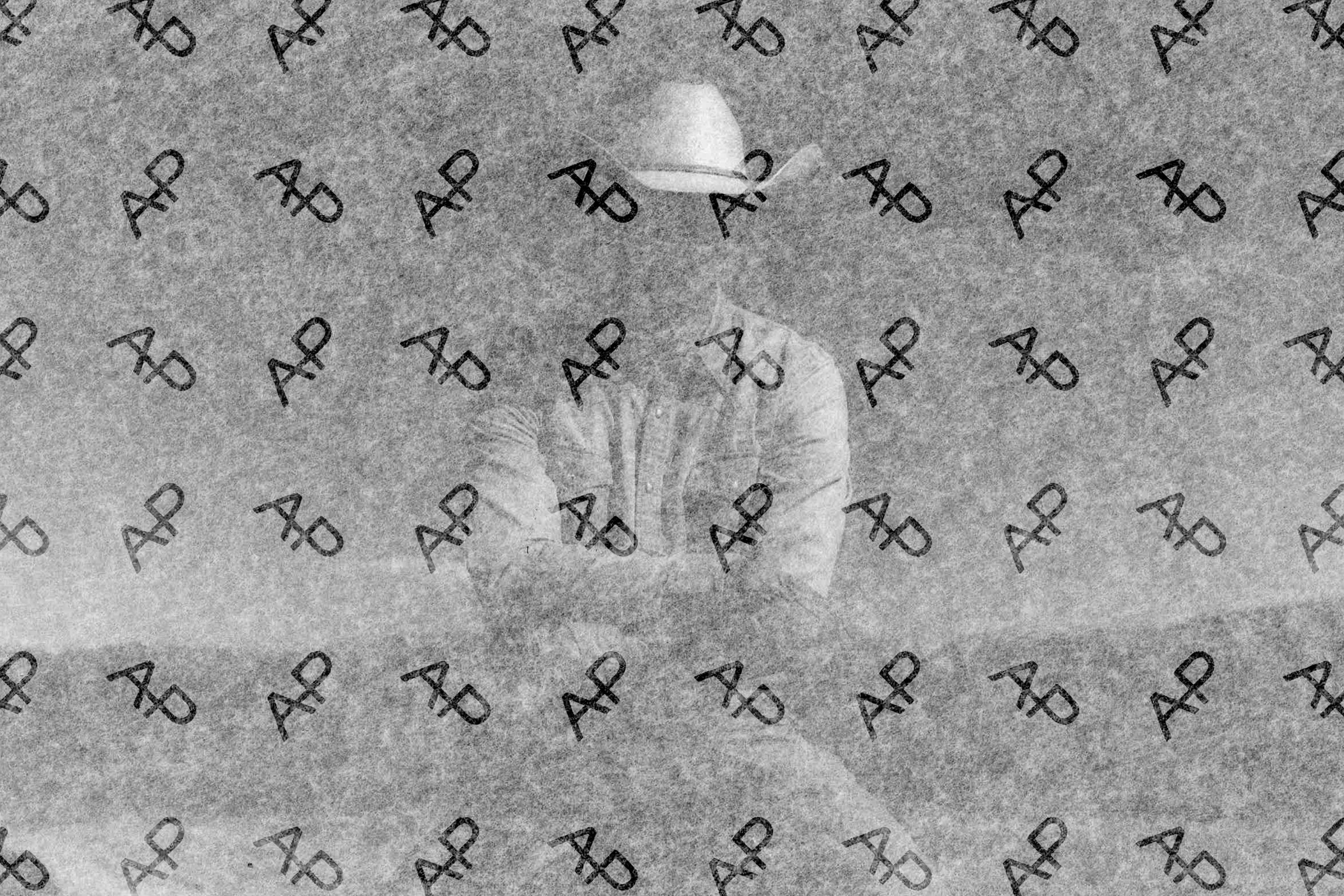 clothing,hat,text,outdoors,formal wear