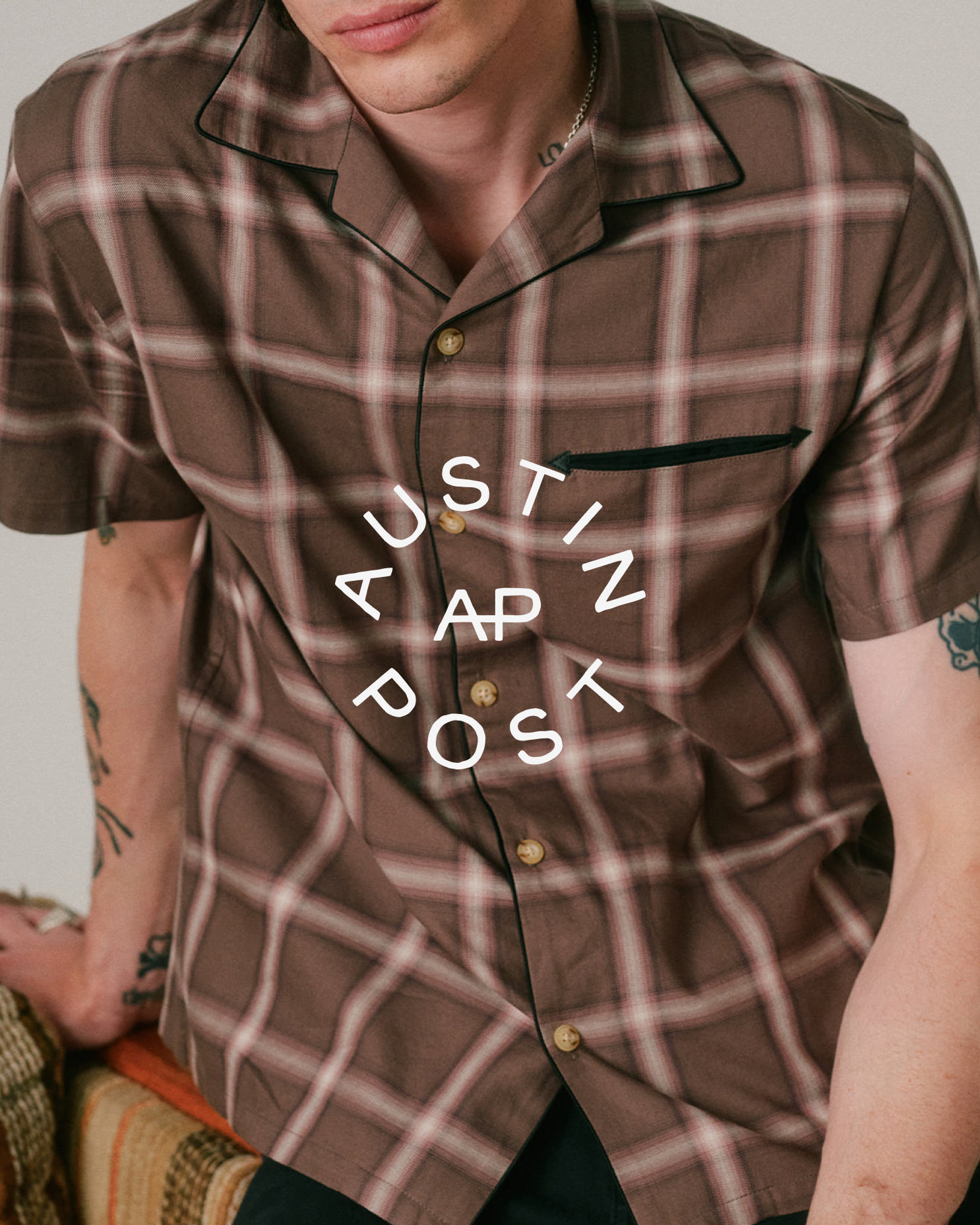 clothing,shirt,blouse,adult,male,man,person,jewelry,necklace,dress shirt